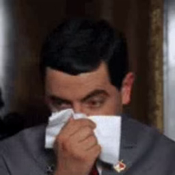 Mr Bean, blowing his nose